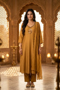 Mustard gold mirror-work suit — front