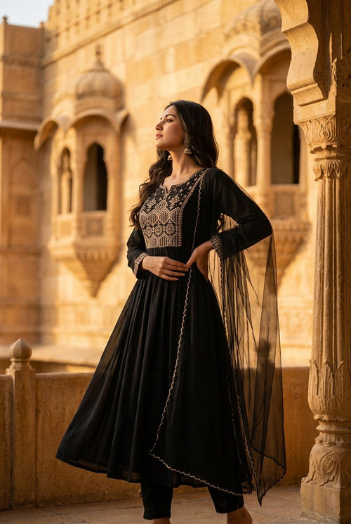 Side view of Biba black zari embroidered anarkali suit set