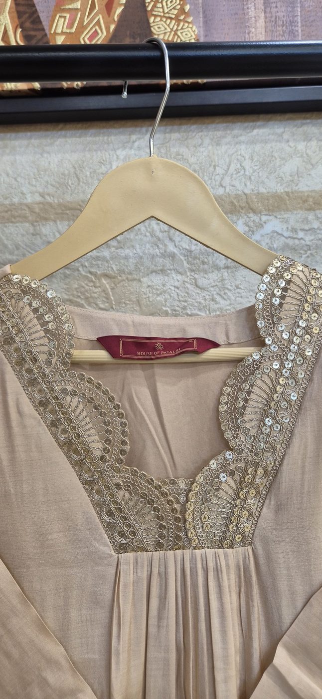 Sadhana beige suit neckline detail